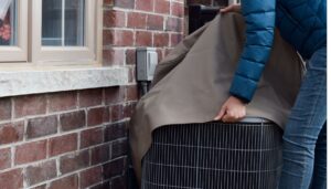 how to keep outside ac unit from freezing in winter