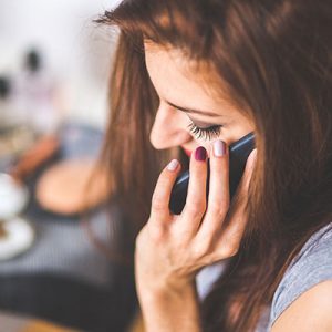 Woman-on-the-phone-calling-for-HVAC-services